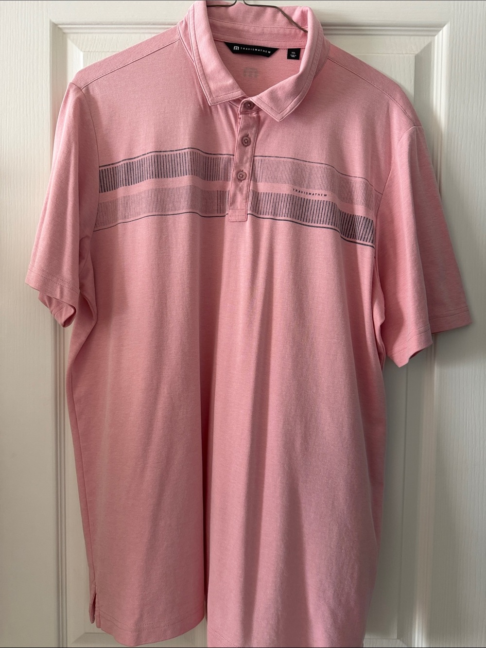 Travis Mathew Pink Polo with Subtle Horizontal Stripe